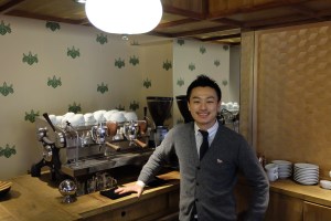 Smiling Barista by Slayer Espresso Machine at Cafe Kitsune Aoyama Tokyo Japan