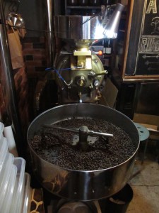 Coffee Roaster with beans at Woodberry Coffee Roasters in Yoga Tokyo Japan