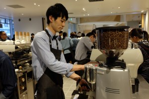 Barista at La Marzocco espresso machine at Blue Bottle Coffee Shinjuku Tokyo Japan