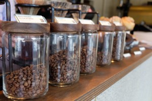 Row of Jars filled with coffee beans at Glitch Coffee and Roasters in Jimbocho Tokyo Japan