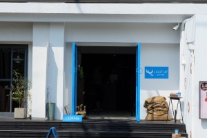 Sign reading coffee in front of Light Up Coffee Kichijoji Tokyo Japan Cafe