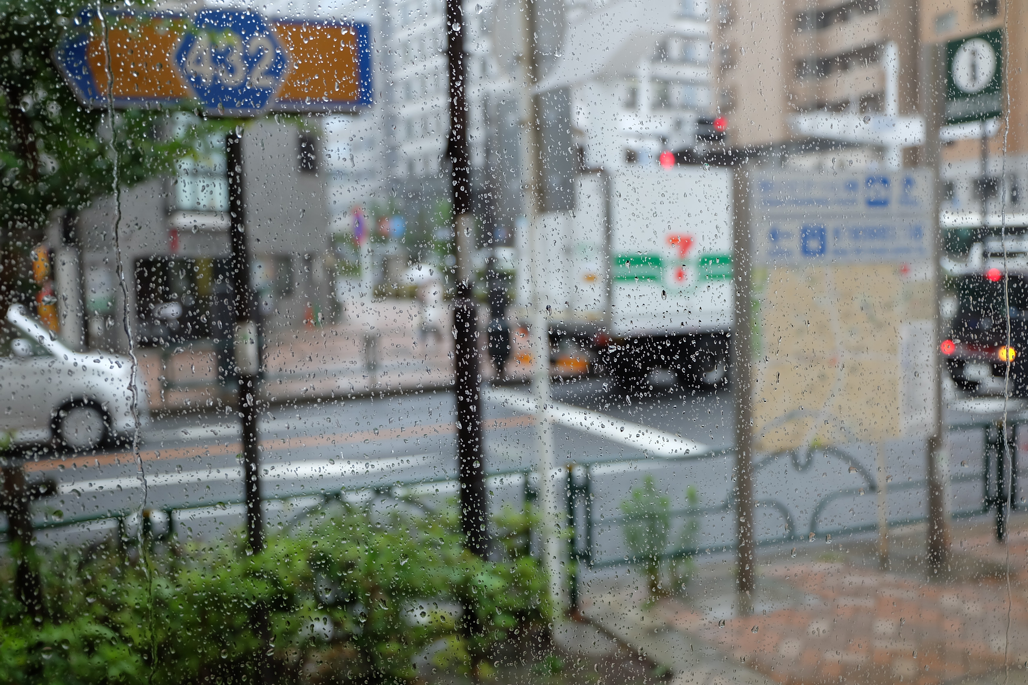 Rain on a window at Counterpart Coffee Gallery Nishi Shinjuku Tokyo Japan