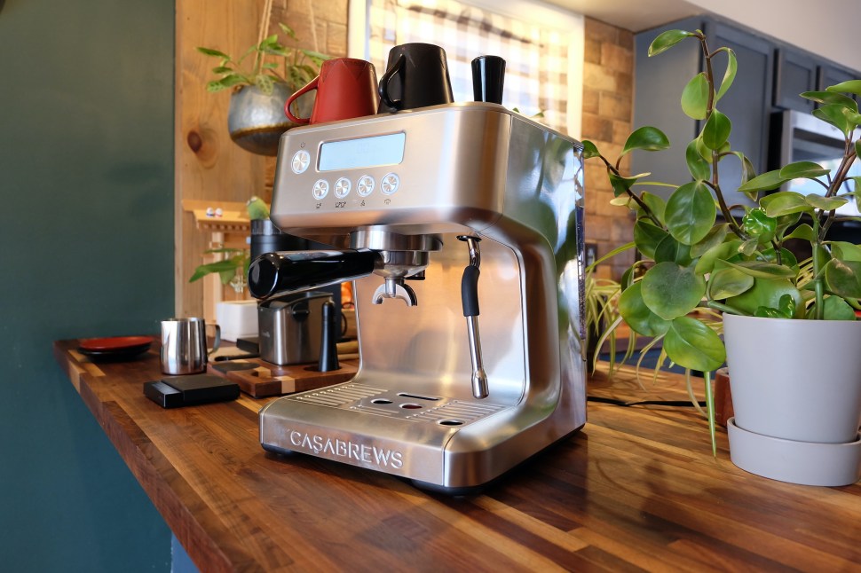 Casabrews Ultra espresso machine with cups on top